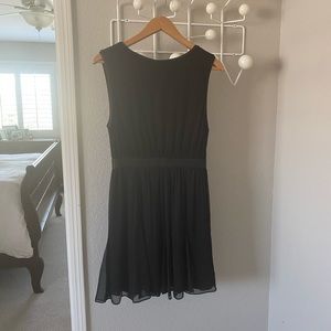 Black cocktail dress w/leather trim, details